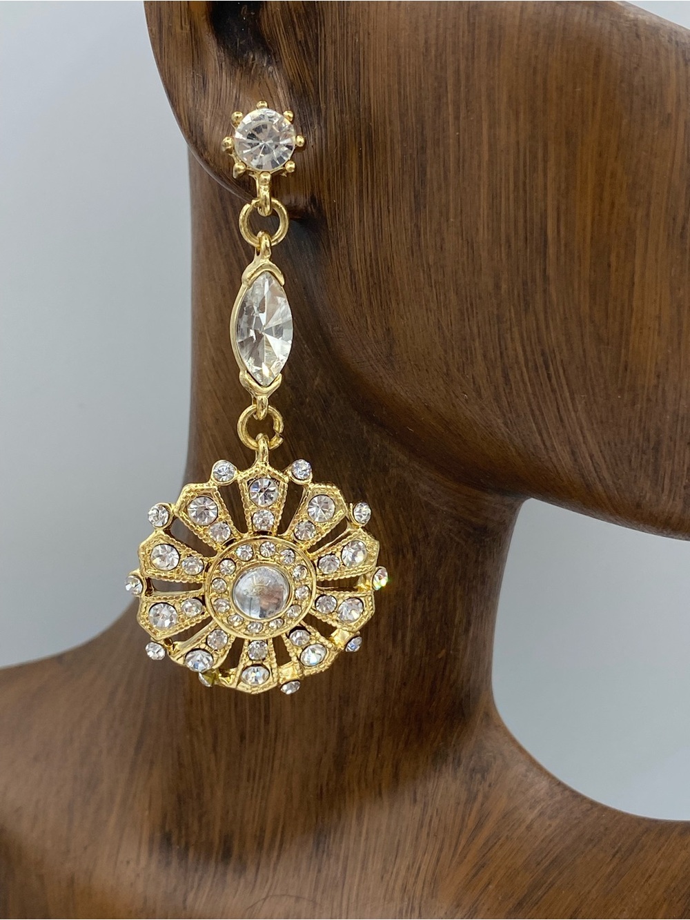 Gold Tone Rhinestone Dangle Earrings With Sunburst Medallion